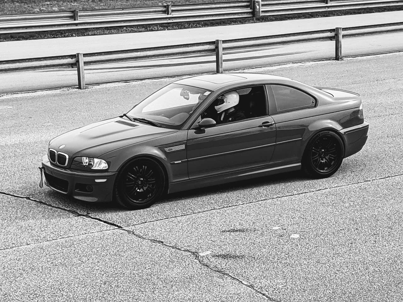 Schyler Manning driving BMW E46 M3 at race track